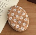 The cutest compact mirror.